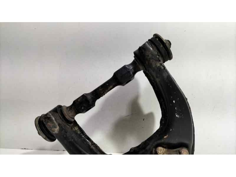 Recambio de brazo suspension superior delantero izquierdo para mitsubishi l 200 (k6/7) 2500 td glx (4-ptas.) referencia OEM IAM 