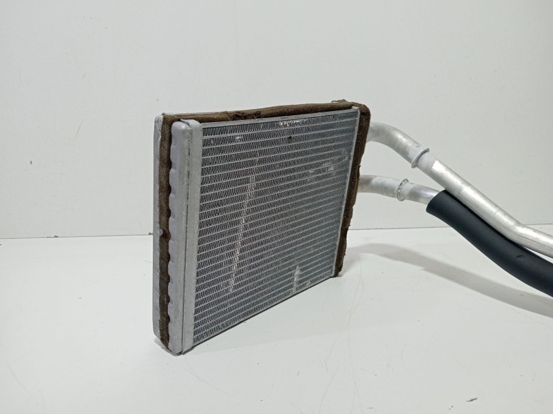 Recambio de radiador calefaccion / aire acondicionado para ford fiesta (cb1) ghia referencia OEM IAM HXJA  