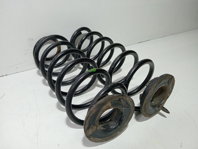 Recambio de muelle amortiguacion para ford fiesta (cb1) ghia referencia OEM IAM GHIA  