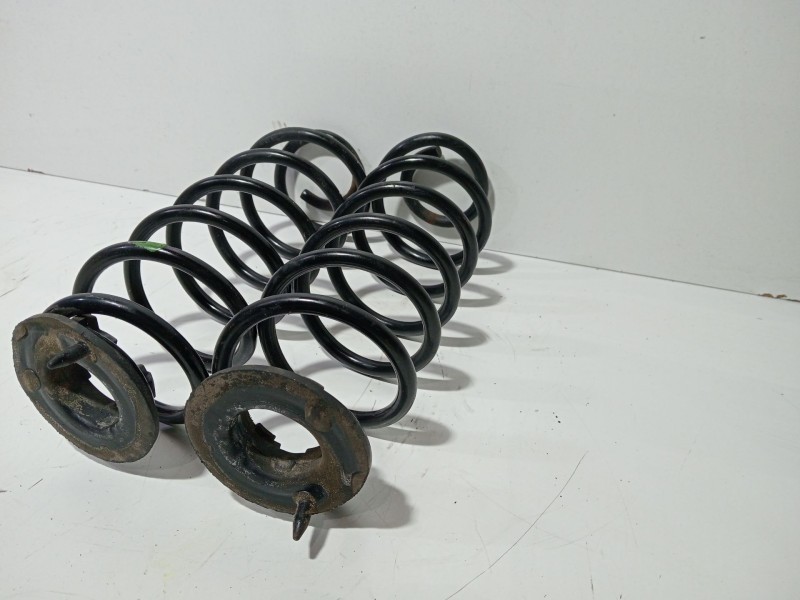 Recambio de muelle amortiguacion para ford fiesta (cb1) ghia referencia OEM IAM GHIA  
