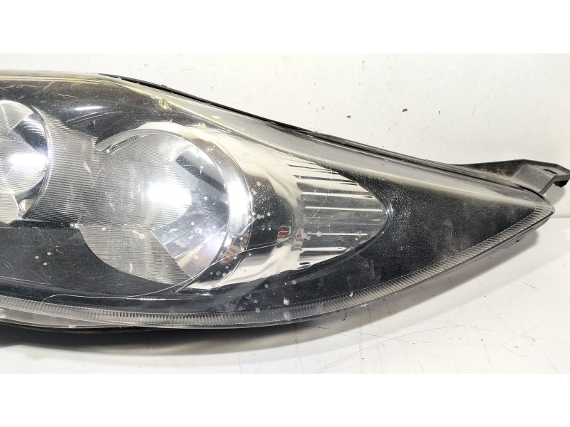 Recambio de faro derecho para ford fiesta (cb1) ambiente referencia OEM IAM 1EJ24704501  